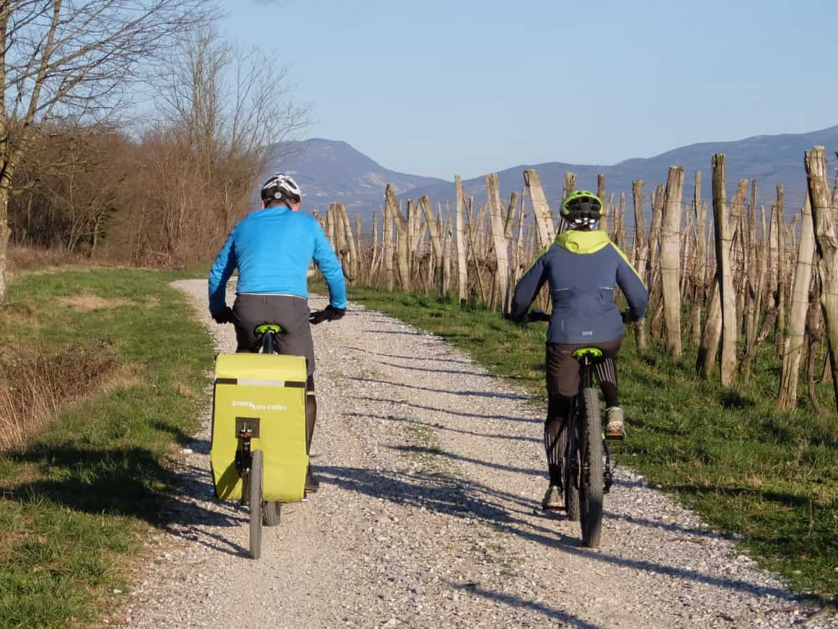 Couple riding ebikes in the Vipava valley. Rental shop RockVelo 