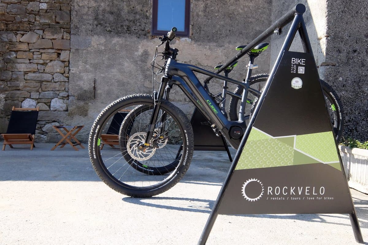 Rental e-bikes by RockVelo in Slovenia. Rental shop setting.