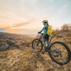 Woman with rental e-bike above Vipava valley. RockVelo Tours