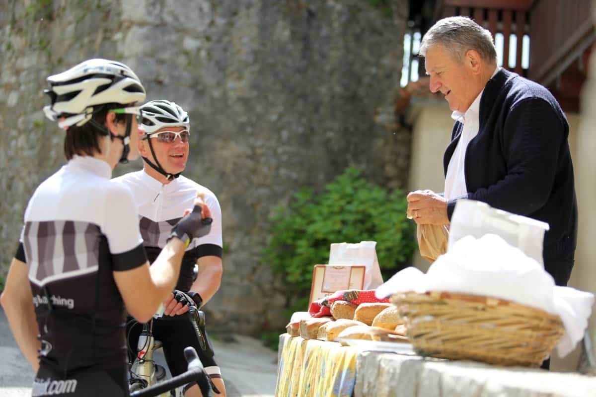 Cyclists having a meal in Slovenia. Tour by RockVelo.